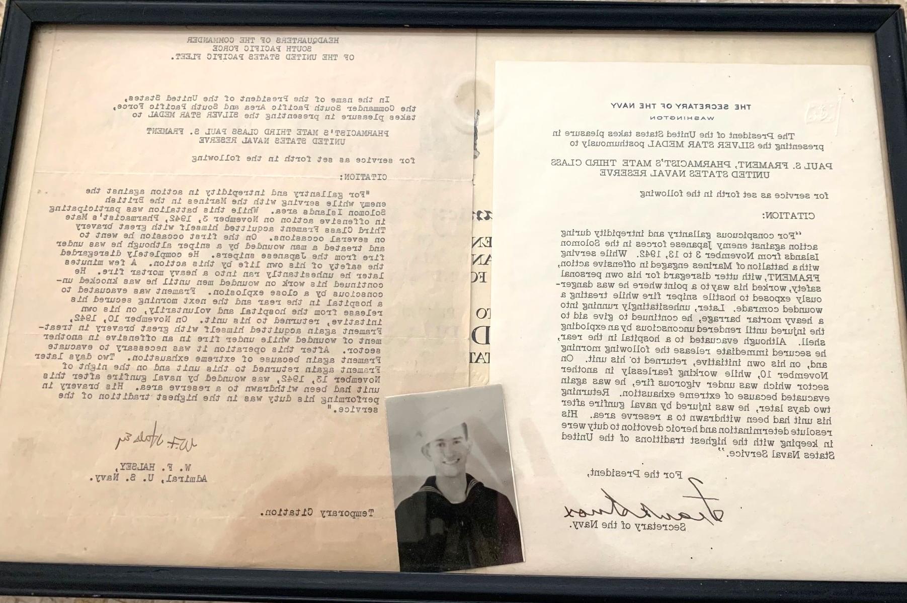 ACPHS校友保罗·斯坦利·弗雷特的照片和他的海军奖状.